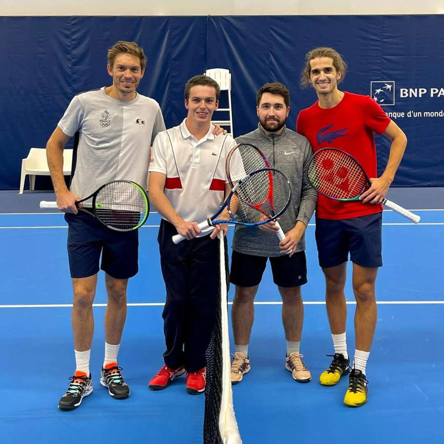 Arthur et son coach avec les champions du double Herbert et Mahut